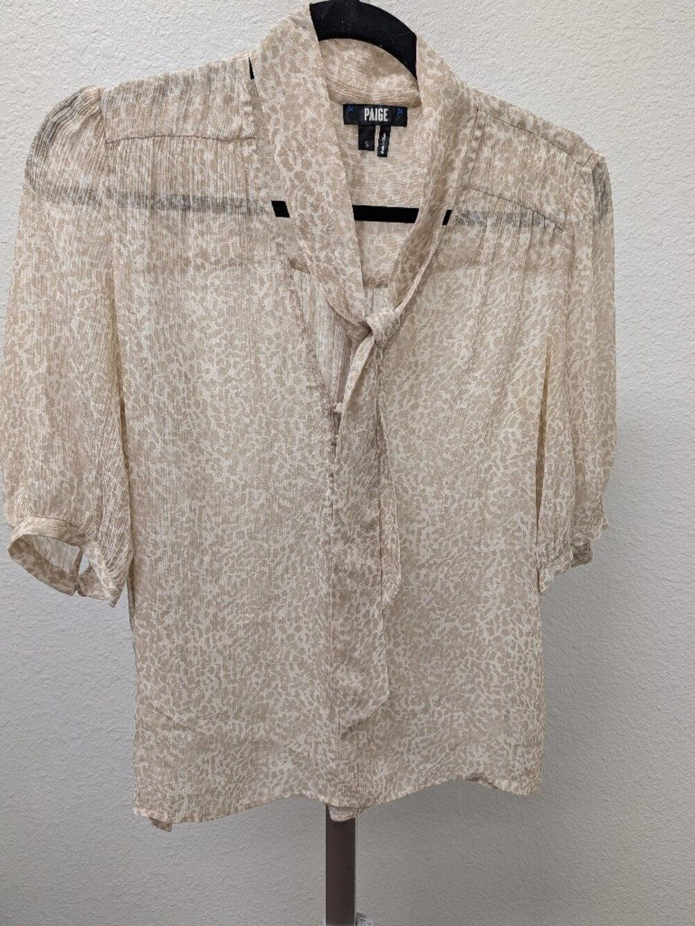 Paige animal print blouse in cream and tan. Size small